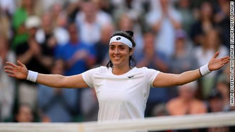 Jabeur celebrates defeating Marie Bouzkova in the Wimbledon quarterfinals. 