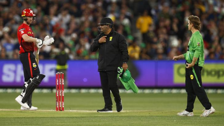 Tom Rogers and Adam Zampa had words after the mankad was sent for third umpire review. Picture: Daniel Pockett