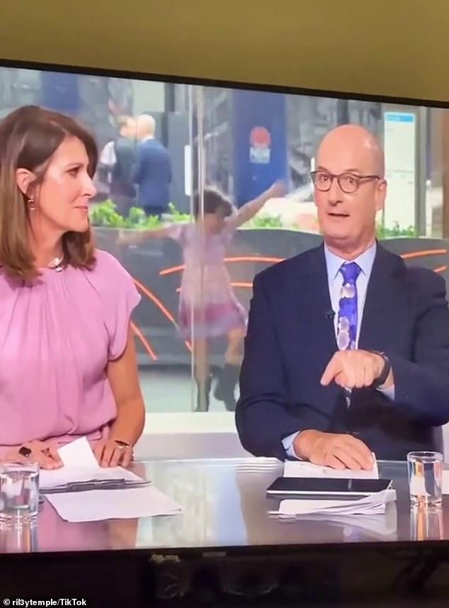 Future star: A girl wearing a pink, purple and lilac dress could be seen dancing up a storm between Sunrise co-hosts David 'Kochie' Koch and Natalie Barr during the live broadcast earlier this week