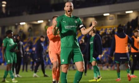 Chesterfield’s Jamie Grimes celebrates the FA Cup second-round win at AFC Wimbledon.
