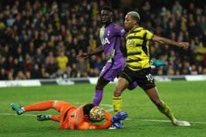 Joao Pedro of Watford FC is taken down in the box by Spurs keeper Hugo Lloris.