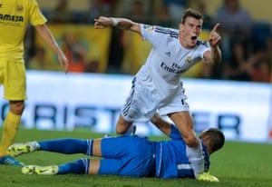 Bale celebrates after scoring on his Madrid debut against Villarreal.
