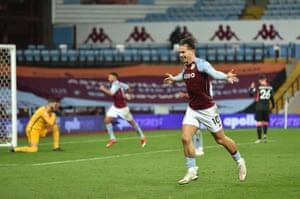 Aston Villa’s Jack Grealish celebrates their third deflected goal.