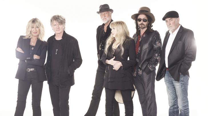 The members of Fleetwood Mac standing against a white background
